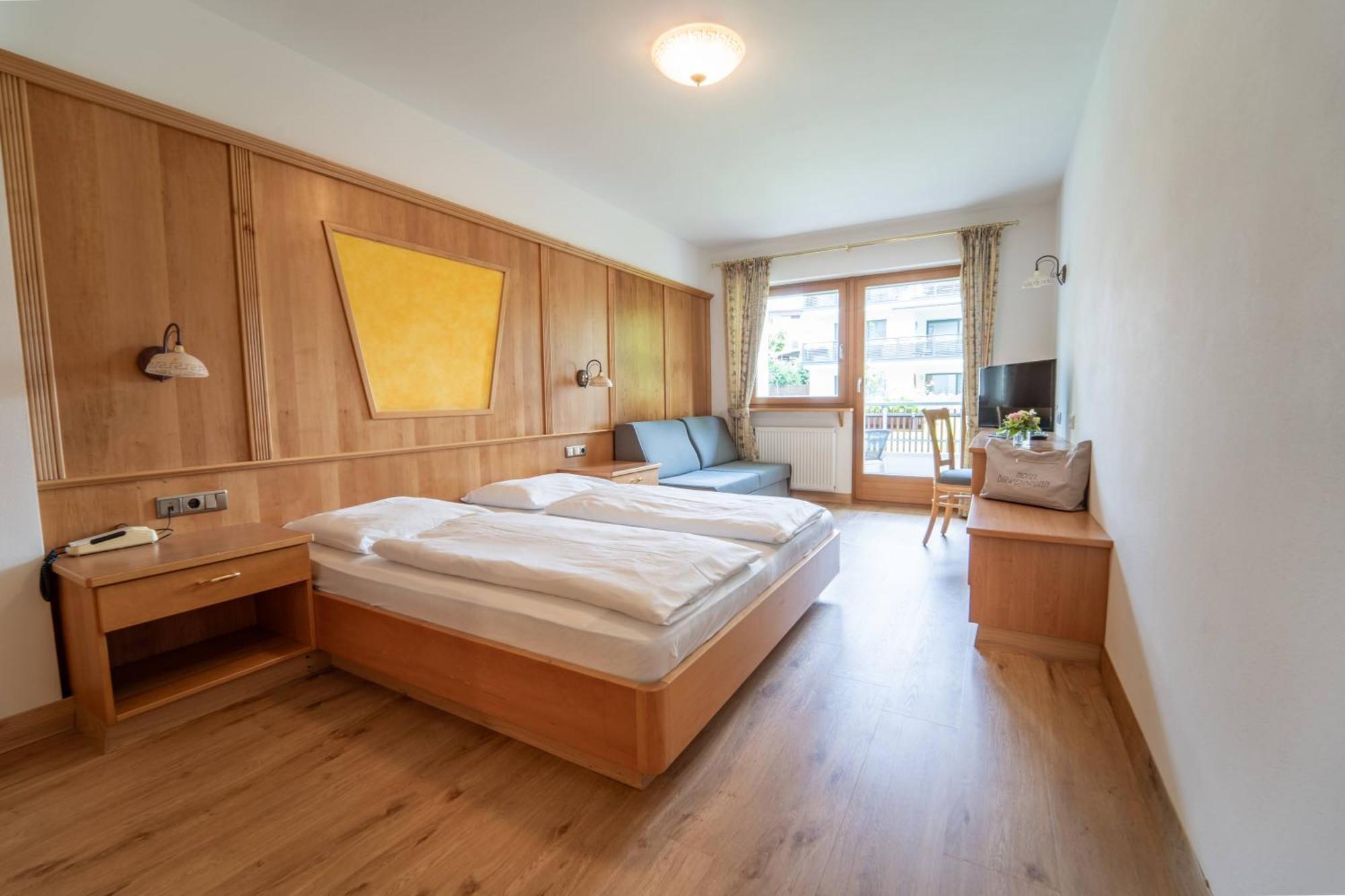 Vierbettzimmer mit Balkon